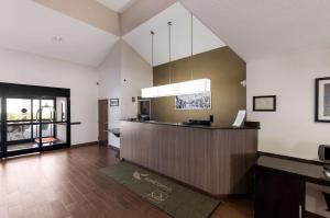 a large kitchen with a counter in a room at Sleep Inn Kernersville I-40 in Kernersville