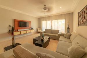 Posezení v ubytování Toquilla Suites - Apartment in Cap Cana, Punta Cana