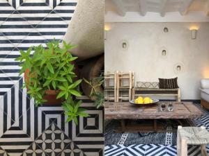 a living room with a table and a plant at Dar Oki in Marrakesh