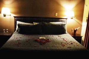 Voodi või voodid majutusasutuse Hotel Flamingo Kristal toas