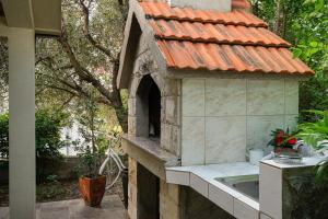 Vonkajšia záhrada v ubytovaní Holiday house with a parking space Orebic, Peljesac - 9482
