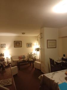 Posezení v ubytování Cama en habitacion compartida