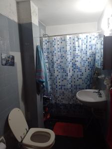 Koupelna v ubytování Cama en habitacion compartida