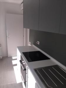 A kitchen or kitchenette at Duomo Inn