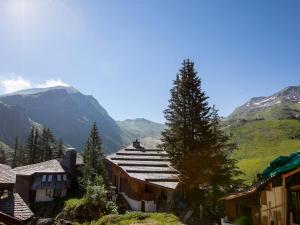 a group of buildings with mountains in the background at Chalet de Luxe à Avoriaz - 12 Pers, Sauna, Cheminée, Services Premium Inclus - FR-1-314-97 in Morzine