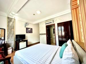 TV a/nebo společenská místnost v ubytování ACE Hotel - Bến Thành