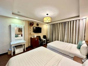 TV a/nebo společenská místnost v ubytování ACE Hotel - Bến Thành + 21 fotografií
