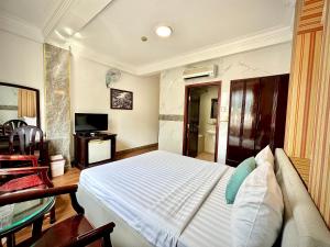 TV a/nebo společenská místnost v ubytování ACE Hotel - Bến Thành
