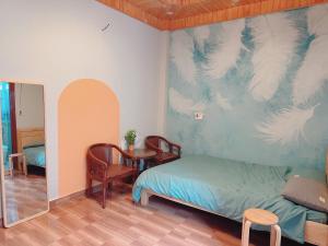 Postel nebo postele na pokoji v ubytování Nấm Home