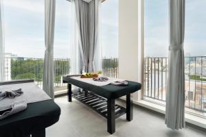 Balkón nebo terasa v ubytování M City Hotel Saigon