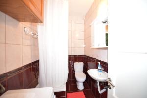 Savić Apartments tesisinde bir banyo +27 fotoğraf