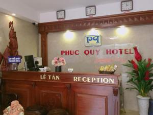 a hotel reception desk in a hotel room at Phúc Quý Hotel - 149B Lê Duẩn - by Bay Luxury in Hanoi