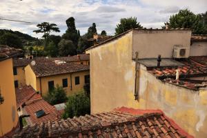 an aerial view of a town with roofs at Apartment Dalla Mirella in Florence