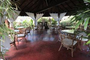 Um restaurante ou outro lugar para comer em Pousada Solar da Praia