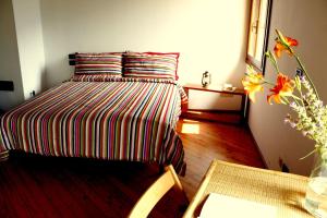 Postel nebo postele na pokoji v ubytování B&B Allo Spizzo