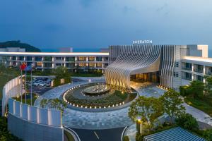 una representación arquitectónica de un edificio con una fachada en espiral en Sheraton Beihai Resort, en Beihai