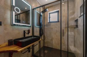 Koupelna v ubytování Cactus Villas