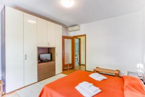 Llit o llits en una habitació de Casa Arno 500m from beach