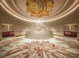 Voodi või voodid majutusasutuse Palazzo Versace Macau toas