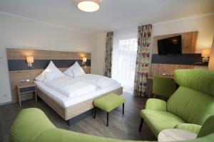 Postel nebo postele na pokoji v ubytování Hotel Das Bayerwald