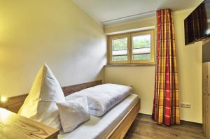 Postel nebo postele na pokoji v ubytování Hotel Das Bayerwald
