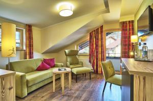 Posezení v ubytování Hotel Das Bayerwald