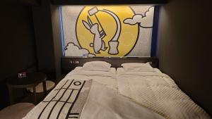Postel nebo postele na pokoji v ubytování HOTEL TAVINOS Kyoto