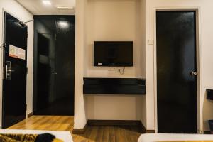 TV a/nebo společenská místnost v ubytování Hotel Sentral Riverview Melaka