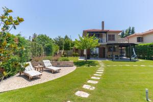 Zahrada ubytování Sani Breeze by halu! + 81 fotografií