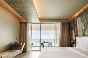Saccharum - Resort and Spa - Savoy Signature客房内的一张或多张床位
