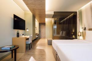 Saccharum - Resort and Spa - Savoy Signature的电视和/或娱乐中心