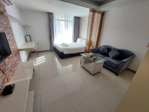 TV a/nebo společenská místnost v ubytování CA&SA Serviced Apartment