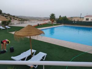A view of the pool at El Mirador de Sierra Mágina entre Granada y Jaén or nearby