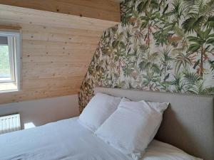 Voodi või voodid majutusasutuse Maison Patisson toas