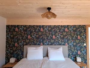 Voodi või voodid majutusasutuse Maison Patisson toas