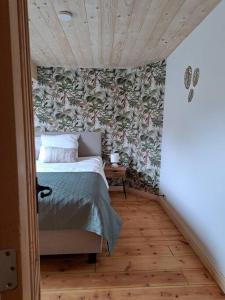 Voodi või voodid majutusasutuse Maison Patisson toas