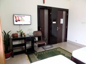 TV o dispositivi per l'intrattenimento presso Sublime Homestay