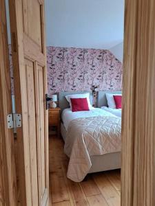 Voodi või voodid majutusasutuse Maison Patisson toas