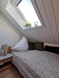 Postel nebo postele na pokoji v ubytování Fewo Strandkrabbe DG