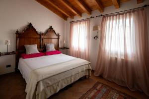 Postel nebo postele na pokoji v ubytování Agriturismo Terre Bianche