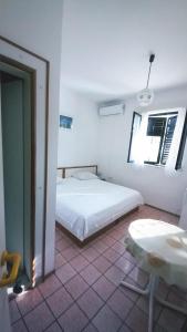 Postel nebo postele na pokoji v ubytování Villa Michel