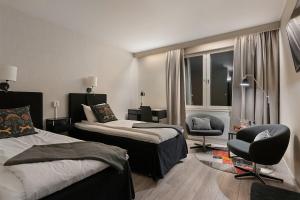 Postel nebo postele na pokoji v ubytování Quality Hotel Vänersborg + 18 fotografií