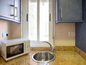 Η κουζίνα ή μικρή κουζίνα στο LANZADA HOLIDAYS +53 φωτογραφίες