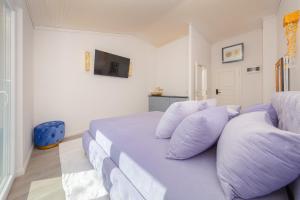 Et tv og/eller underholdning på Boutique Residence Sundays