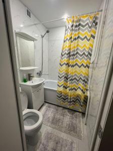 Koupelna v ubytování Квартира 1.5