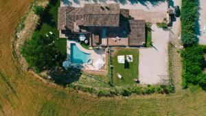 an overhead view of a house in a field at Villa Lucia - Homelike Villas in Camporotondo di Fiastrone