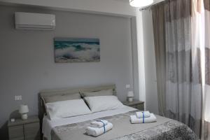 Postel nebo postele na pokoji v ubytování Casa Ponente