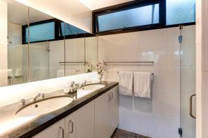 A bathroom at Waves 1 Hamilton Island - Ocean Views and buggy
