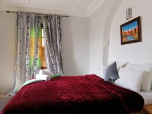 Postel nebo postele na pokoji v ubytování Chambre d'hôtes aya
