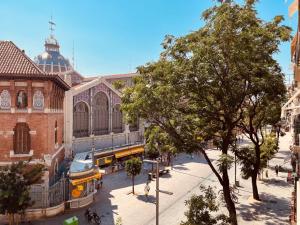 a view of a street in a city with a building at BET Apartments - Central Market Apartments in Valencia